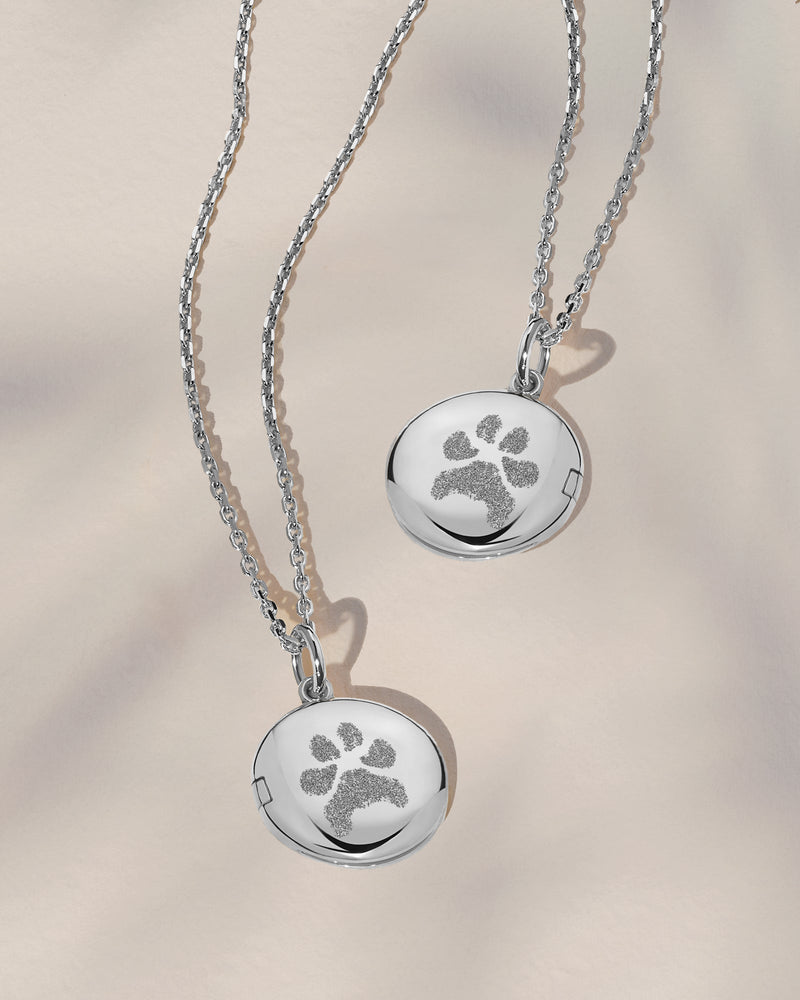 The Double Sided Paw Print Round Locket Necklace